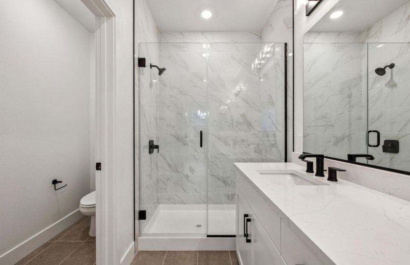 Primary bathroom with glass walk-in shower