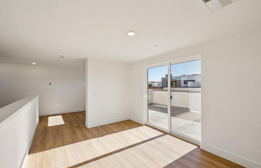 Mezzanine space with rooftop patio access