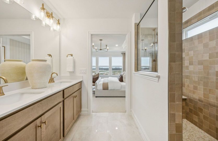 Spacious owner's bath with upgraded shower