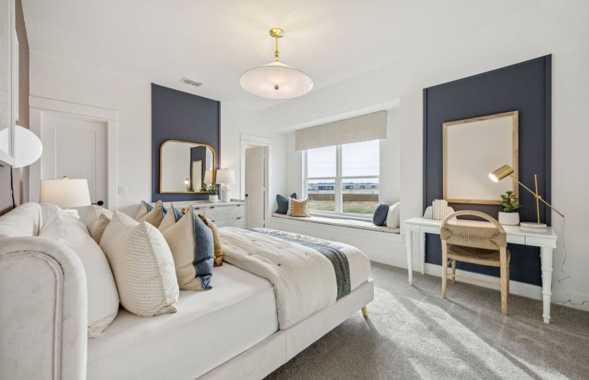 Spacious secondary bedroom with window seat