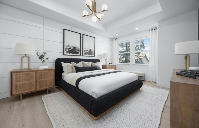 Large primary bedroom with coffered ceiling