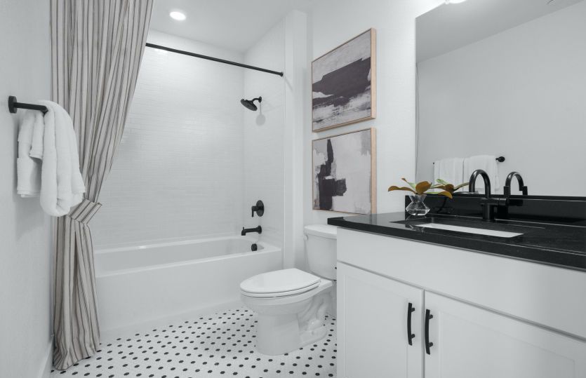 Secondary bathroom with tub shower