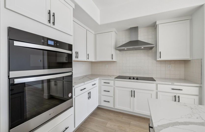 Kitchen with chef's appliance package
