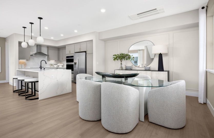 Cafe dining area open to kitchen and gathering room