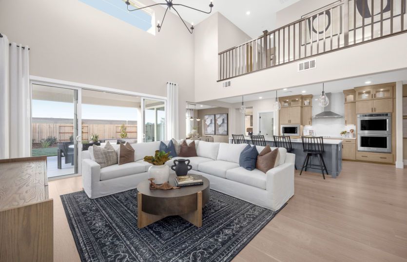 Open main living area with double height ceilings