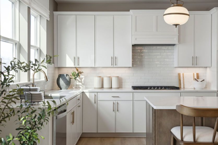 A modern chef’s kitchen with an island that’s perfect for meal prep or casual dining.