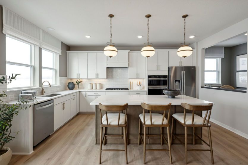 A modern chef’s kitchen with an island that’s perfect for meal prep or casual dining.