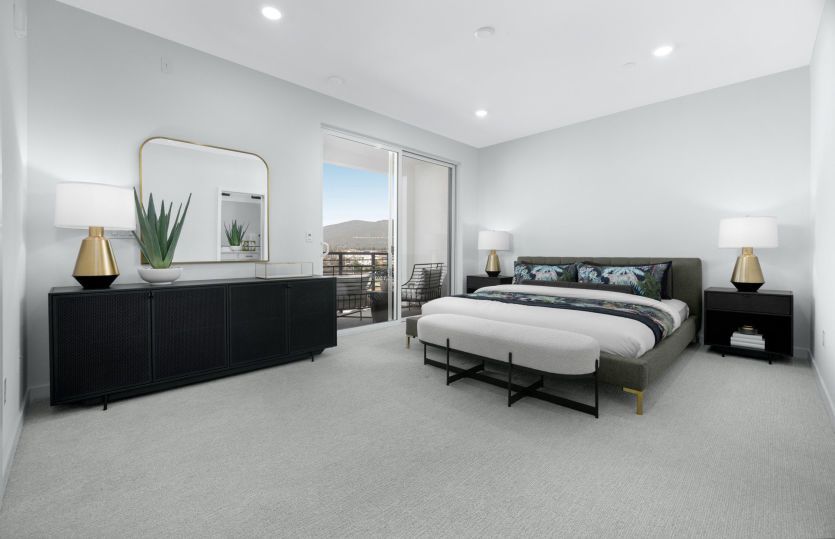 Spacious primary suite with access to the private deck