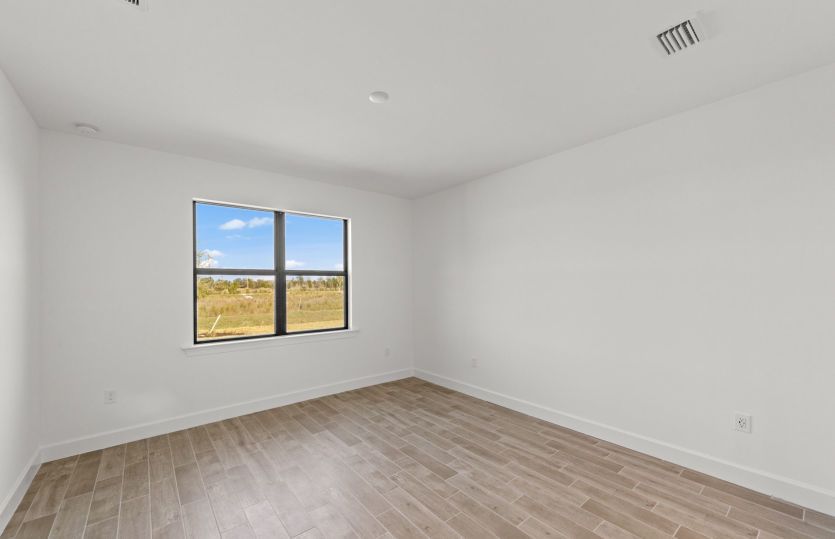 Enjoy a quiet retreat in this ideal owner's suite