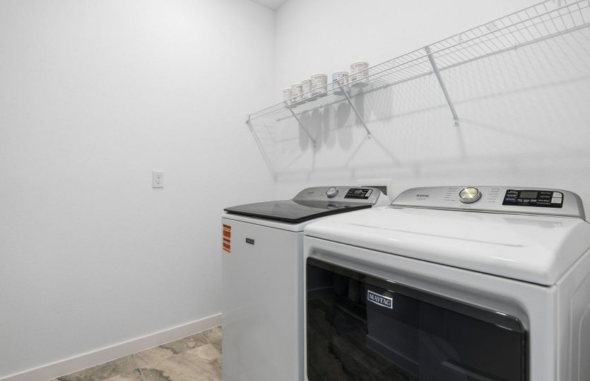 Laundry Room with Whirlpool Washer and Dryer