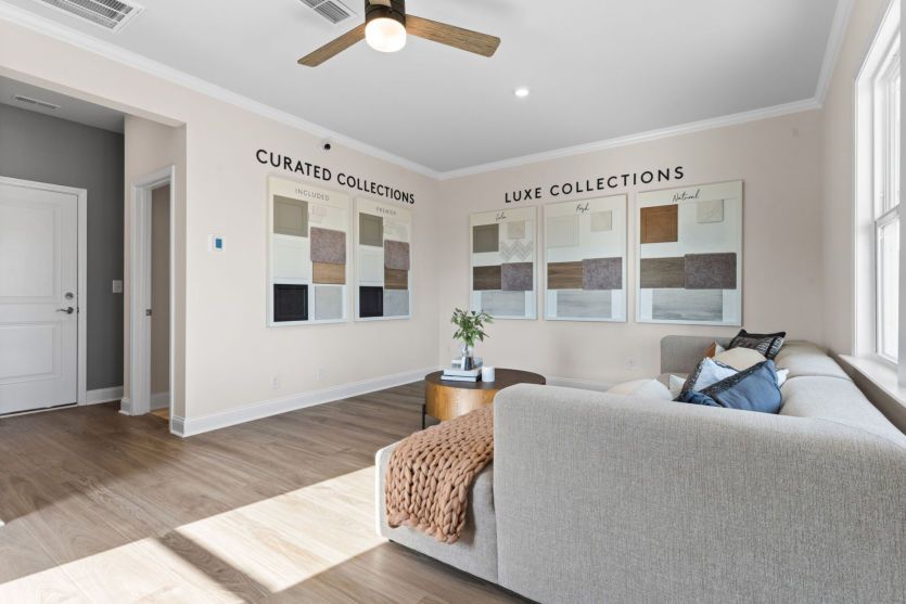 Downstairs Living Room. Model Home Representation.