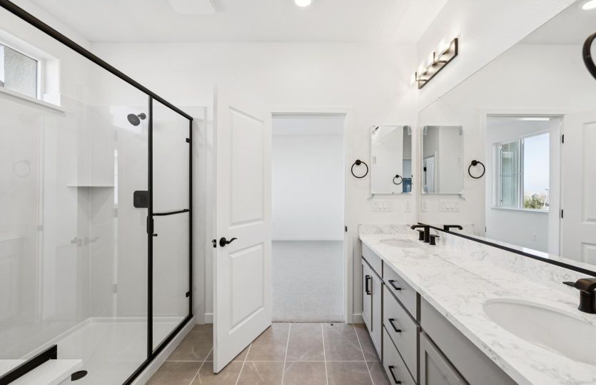Primary bathroom with glass walk-in shower