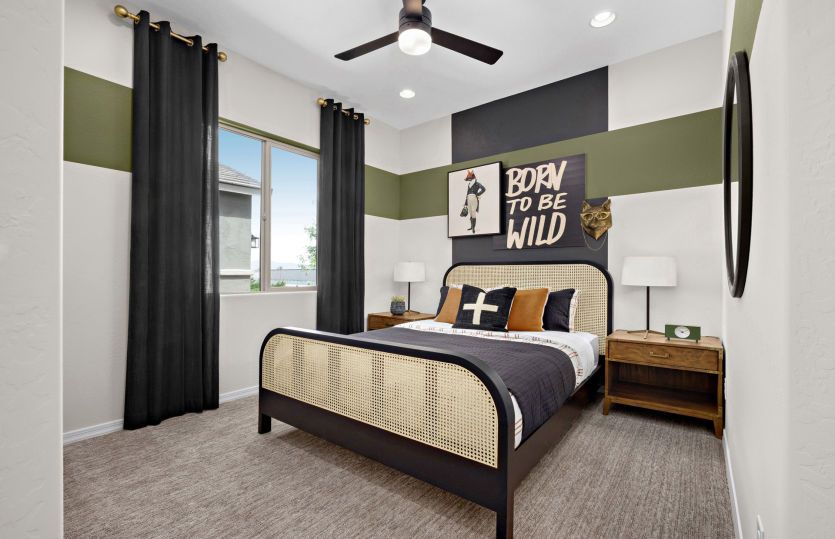 Bedroom 2 includes a bright window, carpet, and it's own closet.