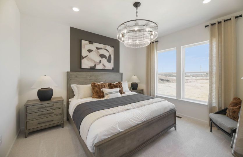 Primary Suite with an Oversized Walk-In Closet and Private Bath