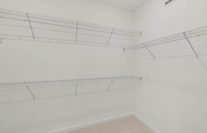 Primary Suite Walk-In Closet