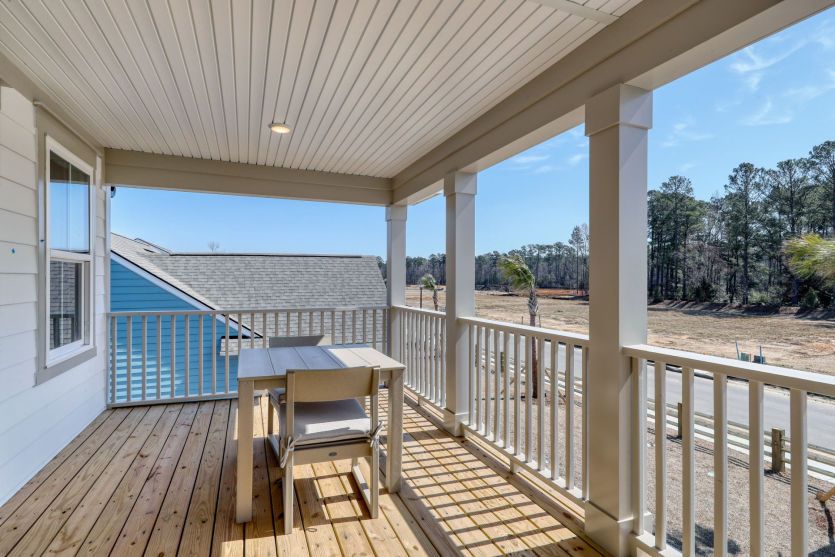Private balcony with elevated views and outdoor living space.