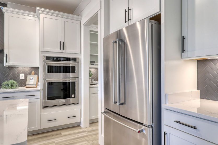 Energy-efficient refrigerator with sleek design and generous storage space.
