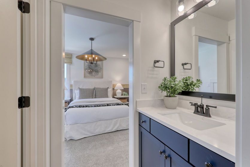 Stylish dual-entry full bathroom with contemporary finishes and functional layout.