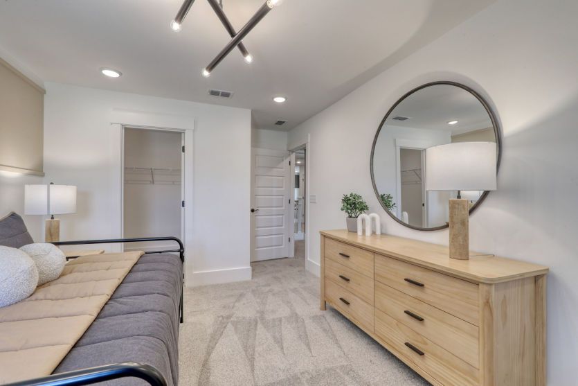 Additional bedroom with convenient access to nearby bathroom.