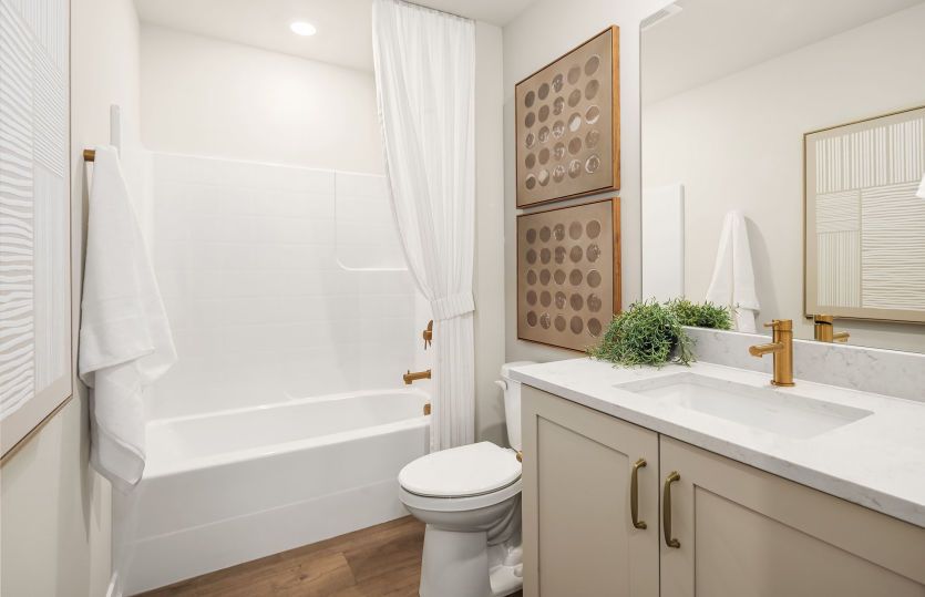 Secondary bedroom with tub and shower