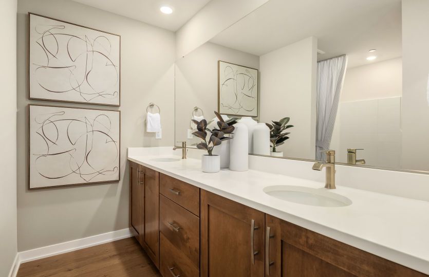 Secondary bathroom with double vanities
