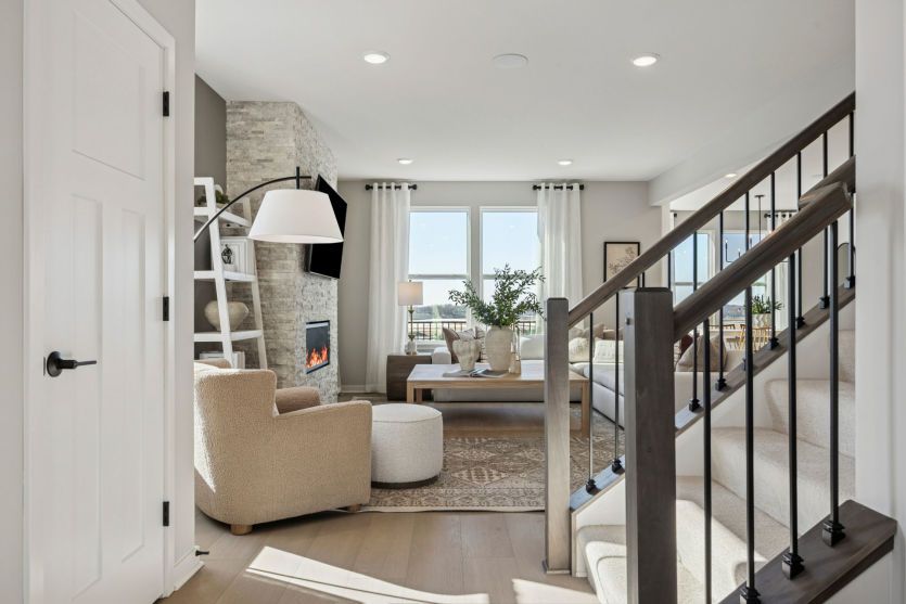 Standing in the foyer, looking into the rest of the spacious home