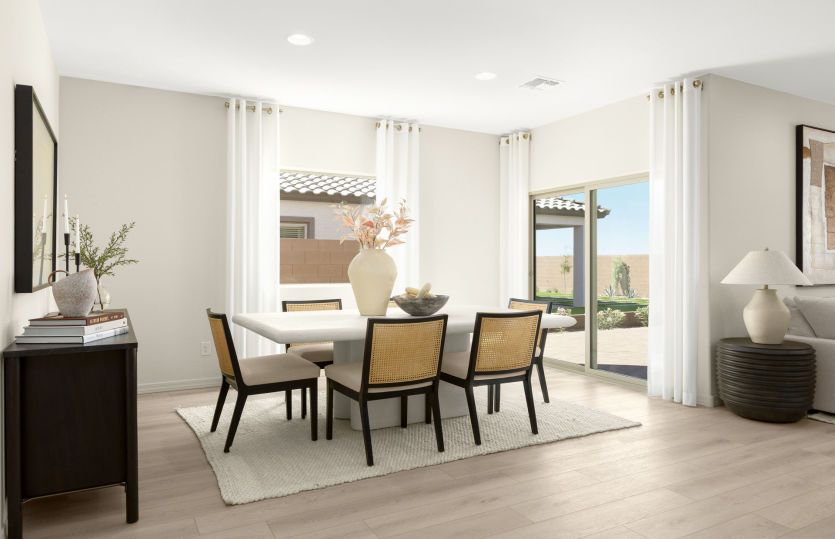 Cafe located just off the kitchen complete with a sliding glass door to the covered patio.