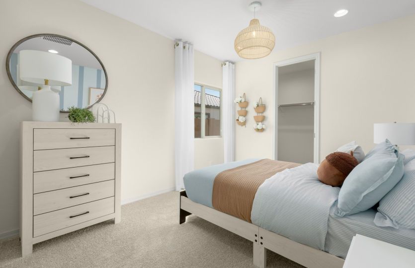Roomy secondary bedrooms in the Nectar home, complete with personal closets.