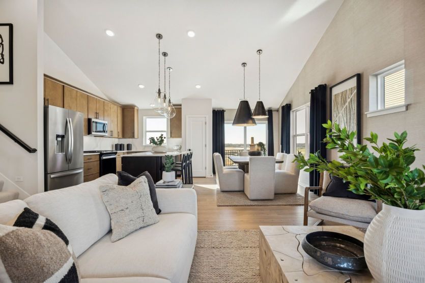 Open-concept design blending kitchen, dining, and living areas effortlessly.