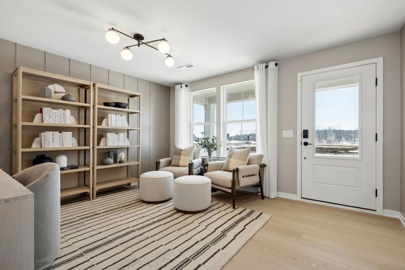Step into the bright and inviting foyer, with the flex room located steps away for easy access.