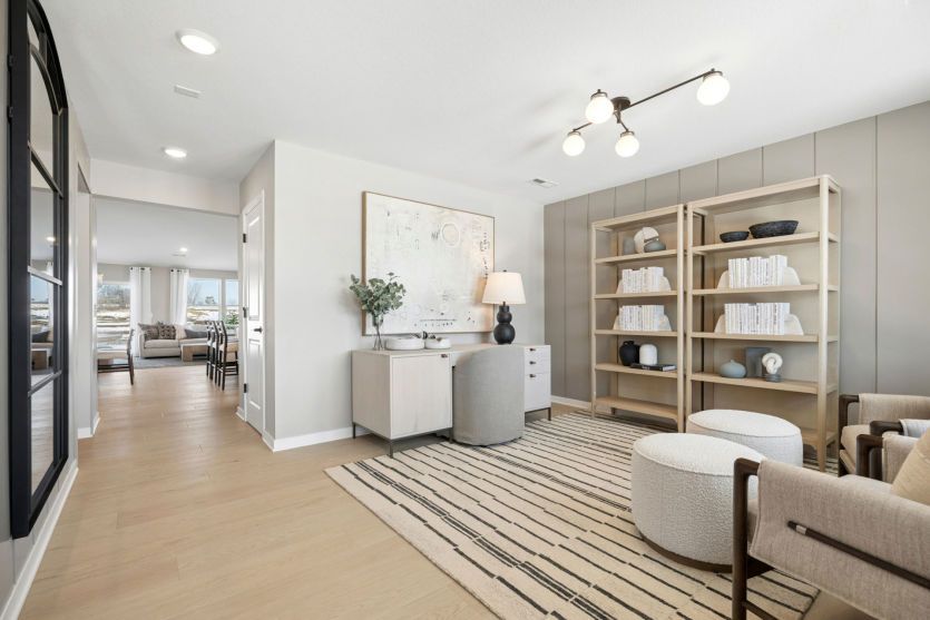 The beautiful foyer, flex room, and beyond as you step into the front door.
