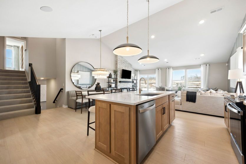 The gathering room, dining room, and kitchen all flow effortlessly together.