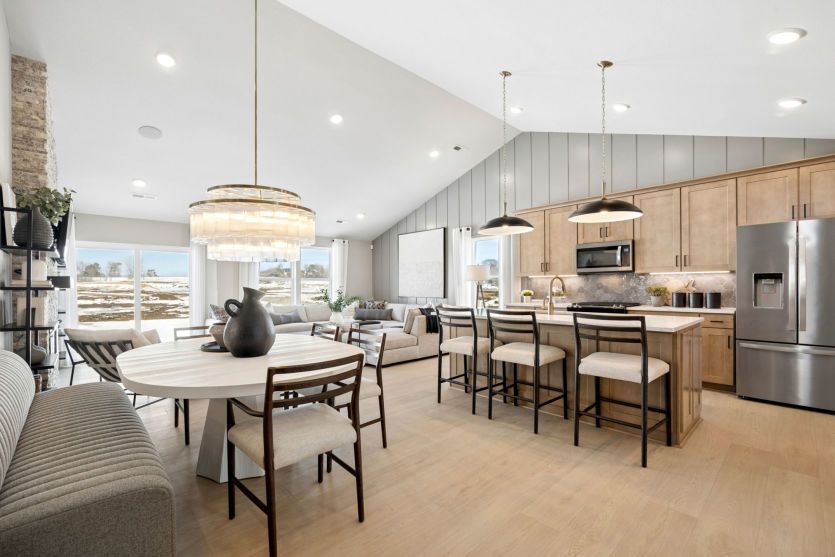 The gathering room, dining room, and kitchen all flow effortlessly together.