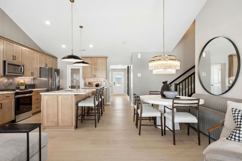 The gathering room, dining room, and kitchen all flow effortlessly together.