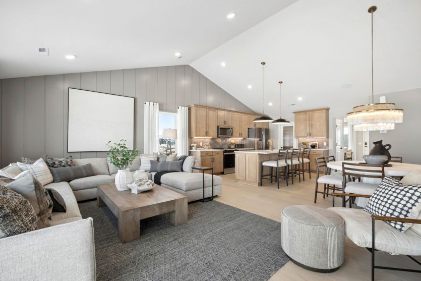 The gathering room, dining room, and kitchen all flow effortlessly together.