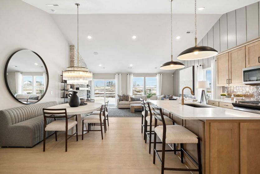 The gathering room, dining room, and kitchen all flow effortlessly together.