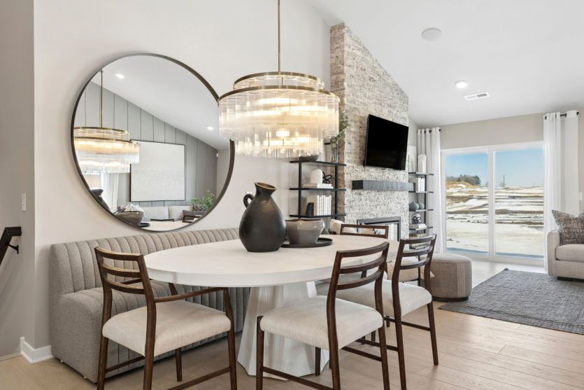The gathering room, dining room, and kitchen all flow effortlessly together.