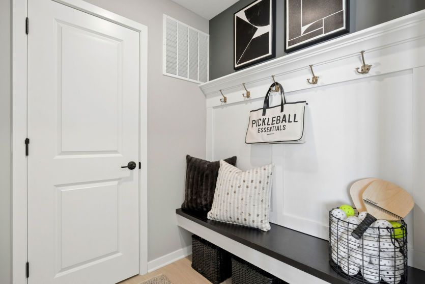 The functional boot bench, right as you walk in from the garage.