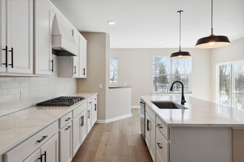 Gourmet kitchen with a center island.