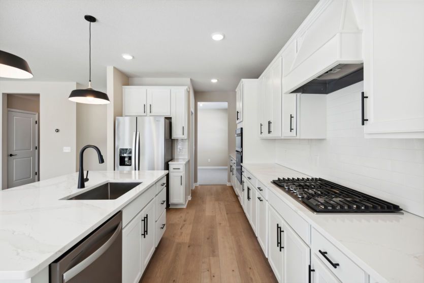 Gourmet kitchen with a center island.