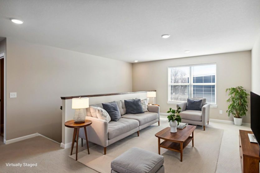 The spacious upper level loft