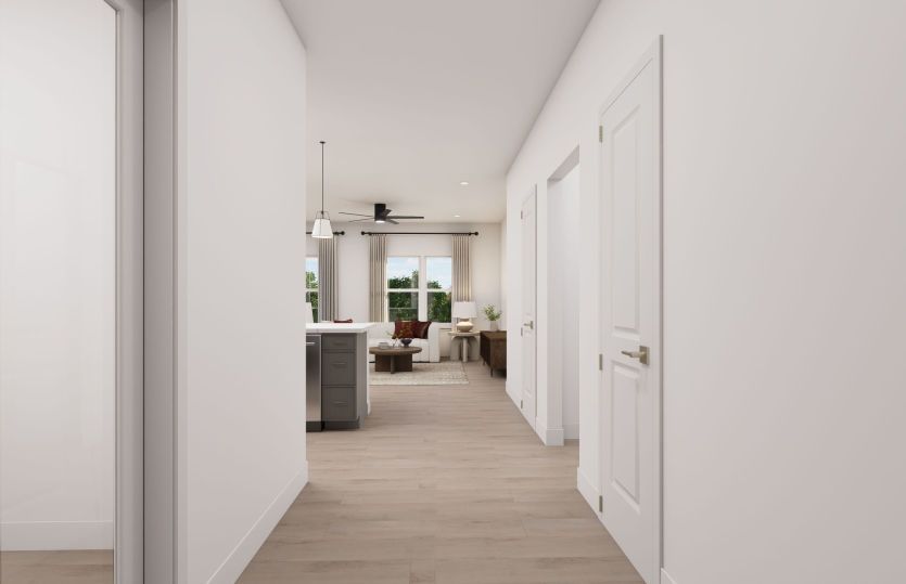 Welcoming Entryway Looks Into The Kitchen