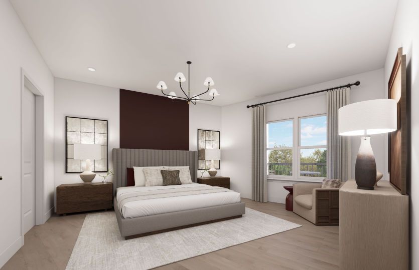 Luxurious Sunlit Primary Suite with a Walk-In Closet and Private Bath