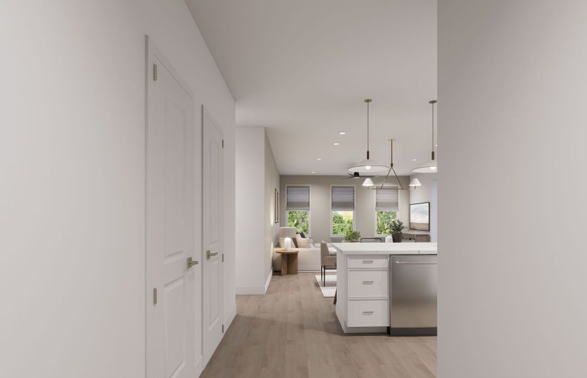 Welcoming Entryway Looks Into The Kitchen