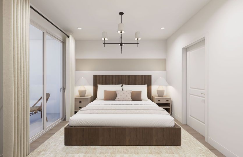 Luxurious Sunlit Primary Suite with a Walk-In Closet and Private Bath