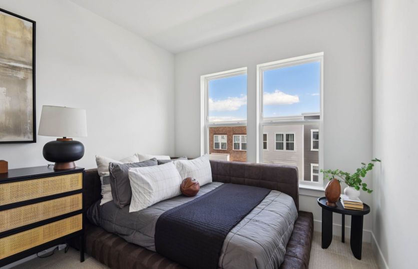 Spacious Secondary Bedroom with Plush Carpeting - Actual Home