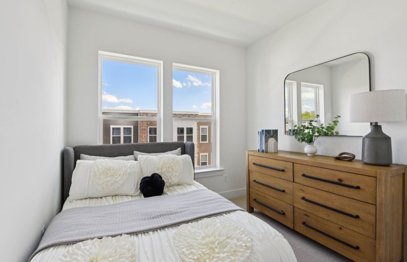 Spacious Secondary Bedroom with Plush Carpeting - Actual Home