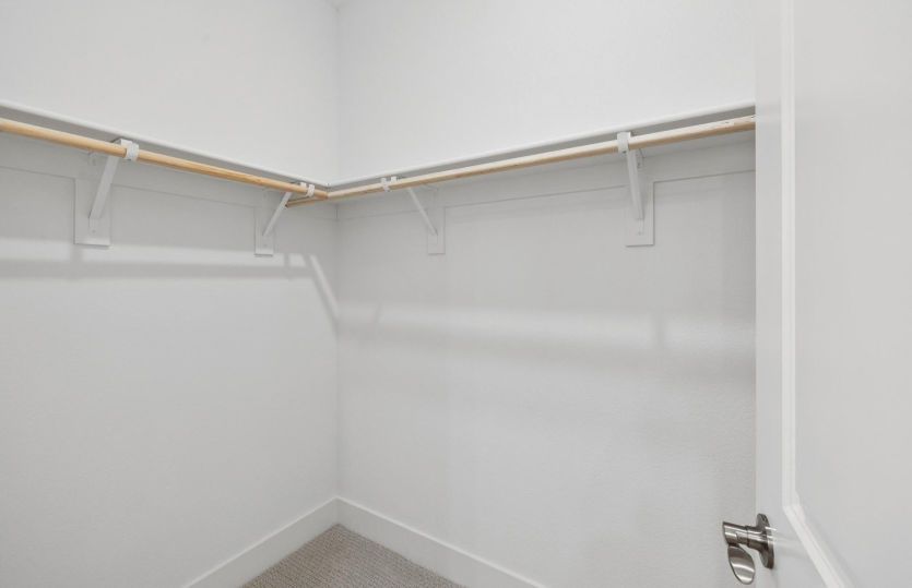 Owner's walk-in closet