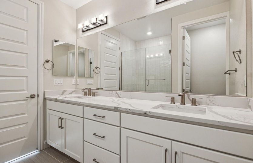 Primary bathroom with dual vanity