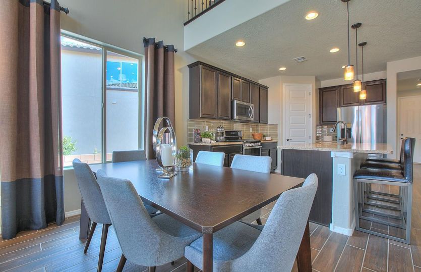 Cafe just off the kitchen provides ease while cooking and entertaining guests at future dinner parti